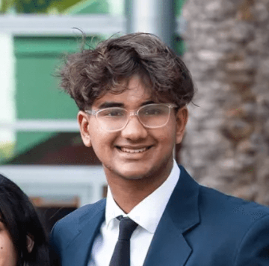 DECA student leader in suit and tie